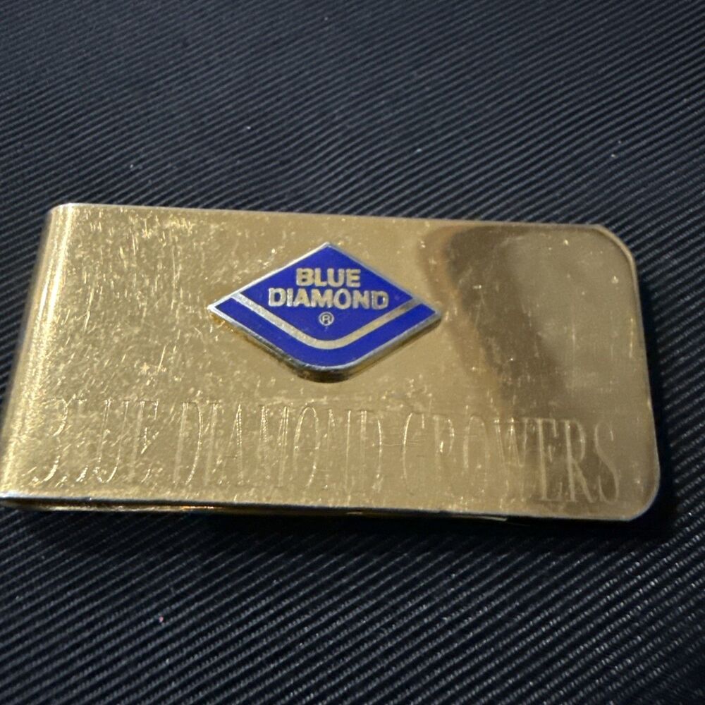 Vintage Blue Diamond Growers Gold Tone Money Clip